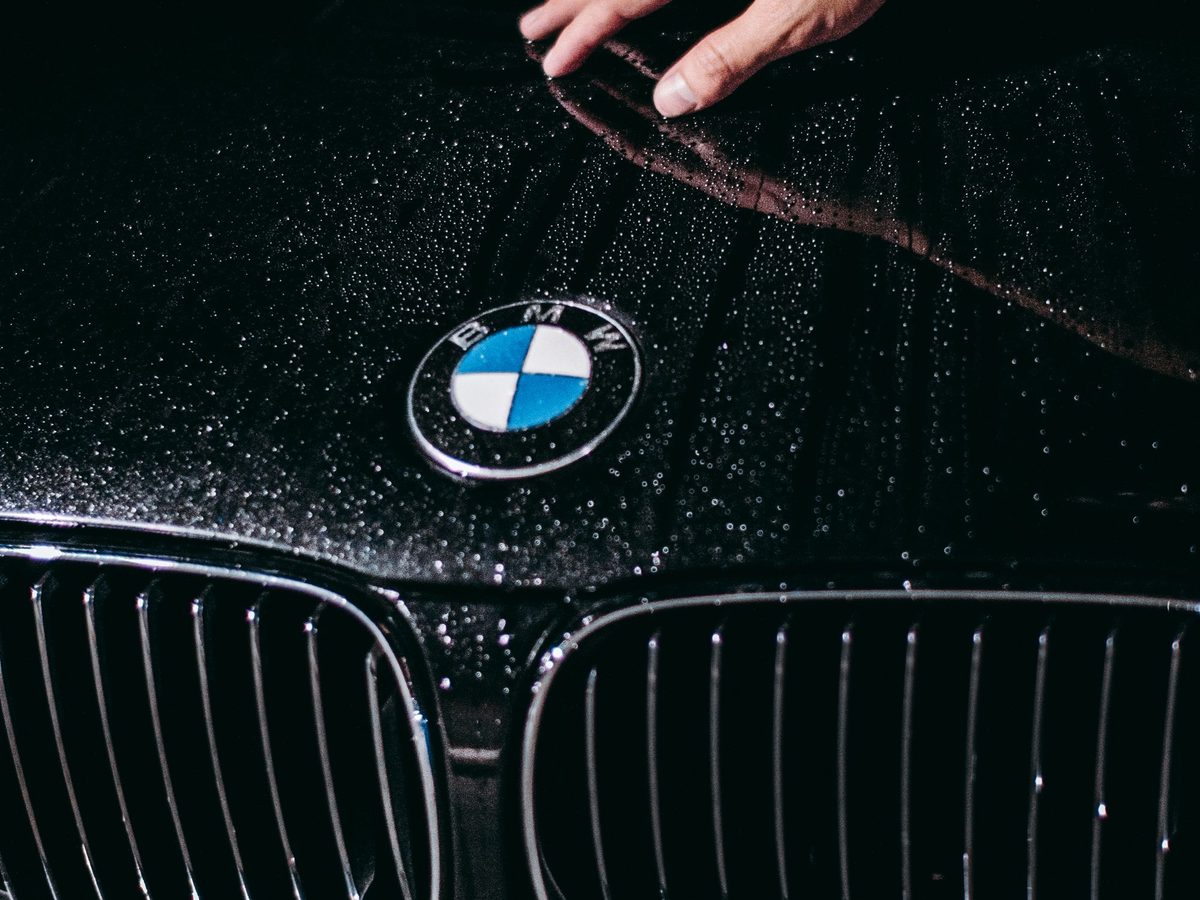 Water beading on a freshly sealed black hood