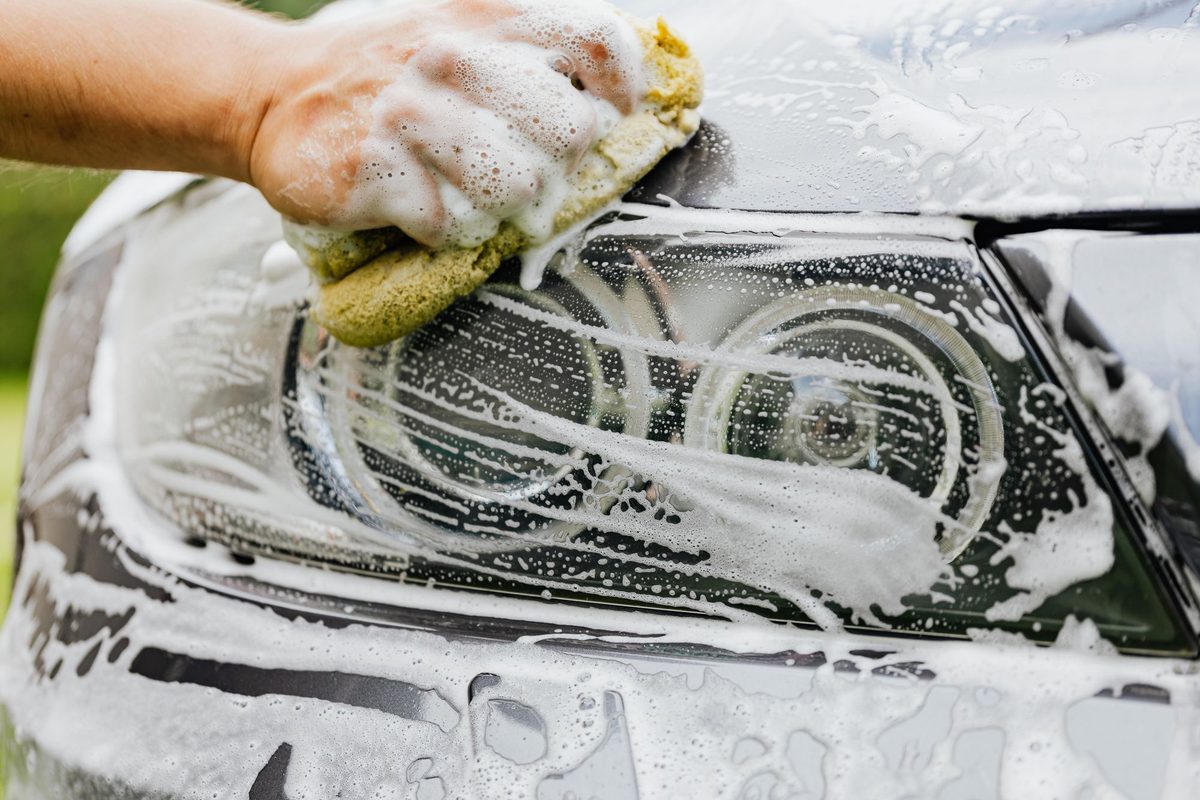 Sponge and suds on a headlight